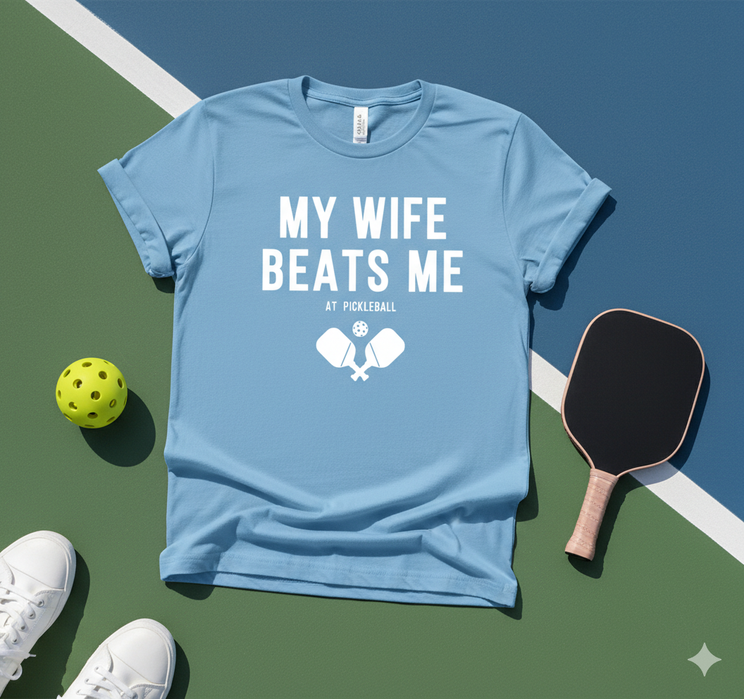 My Wife Beats Me At Pickleball Unisex Pickleball T-Shirt